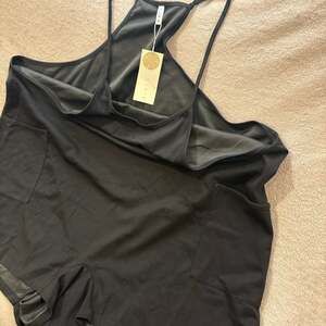 Olrik Women's 4X Black Spaghetti Strap Athletic Romper with Pockets